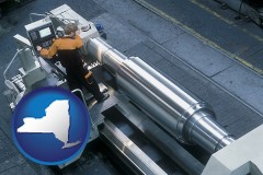 new-york map icon and steel fabrication on an automated lathe